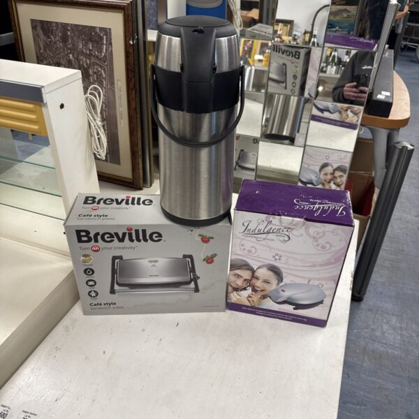 Breville kitchen appliance lot including sandwich press and flask.