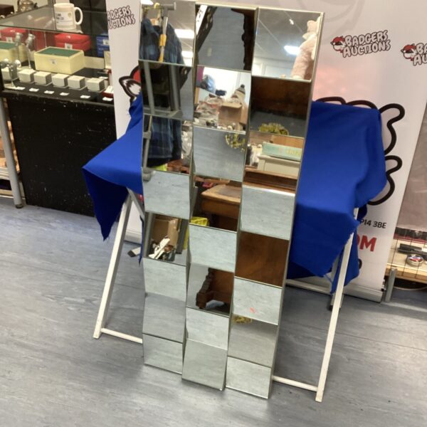 Silvered Delphi mirror measuring 48x18 inches for home decor.