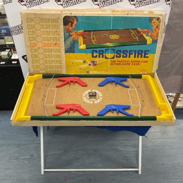 Vintage Ideal Crossfire board game with ball launchers.