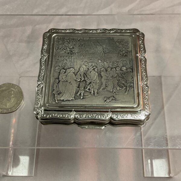 Vintage Stratton compact mirror with etched design.