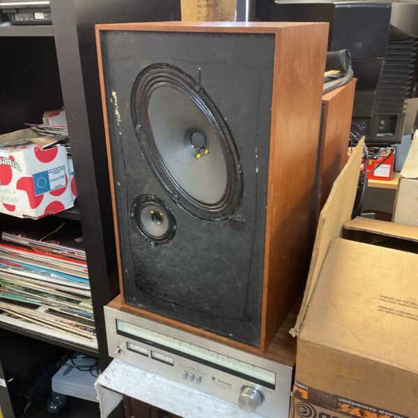 Vintage Technics speakers in unrestored condition, ideal for retro audio setups.