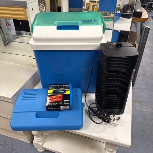 Vintage Waeco frigobox chiller with accessories for portable cooling.