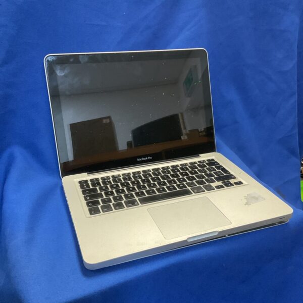 Silver Apple Macbook Pro A1286 laptop for spares and repair.