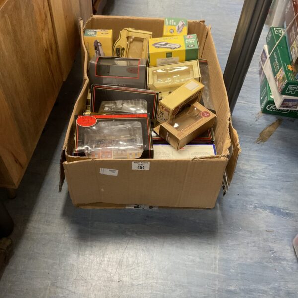 Lot of empty diecast car boxes for collectors.