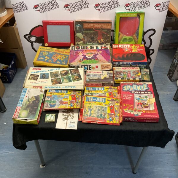 A colourful lot of vintage board games including Tom and Jerry and Battleships.