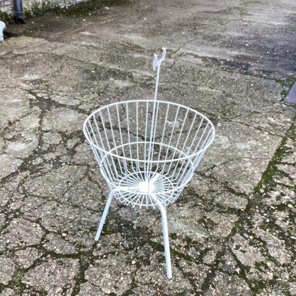 Vintage wire garden planter with three legs.