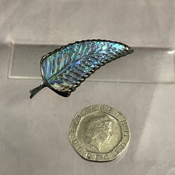 Iridescent abalone shell and silver leaf brooch, vintage jewellery.