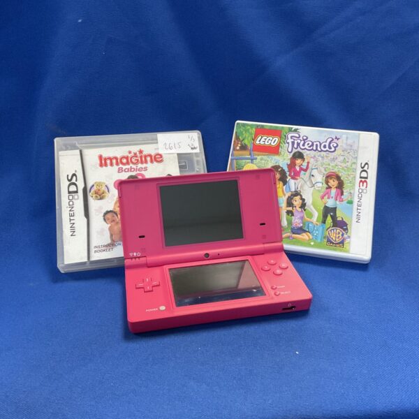 Pink Nintendo DSi console with games, retro handheld gaming system.