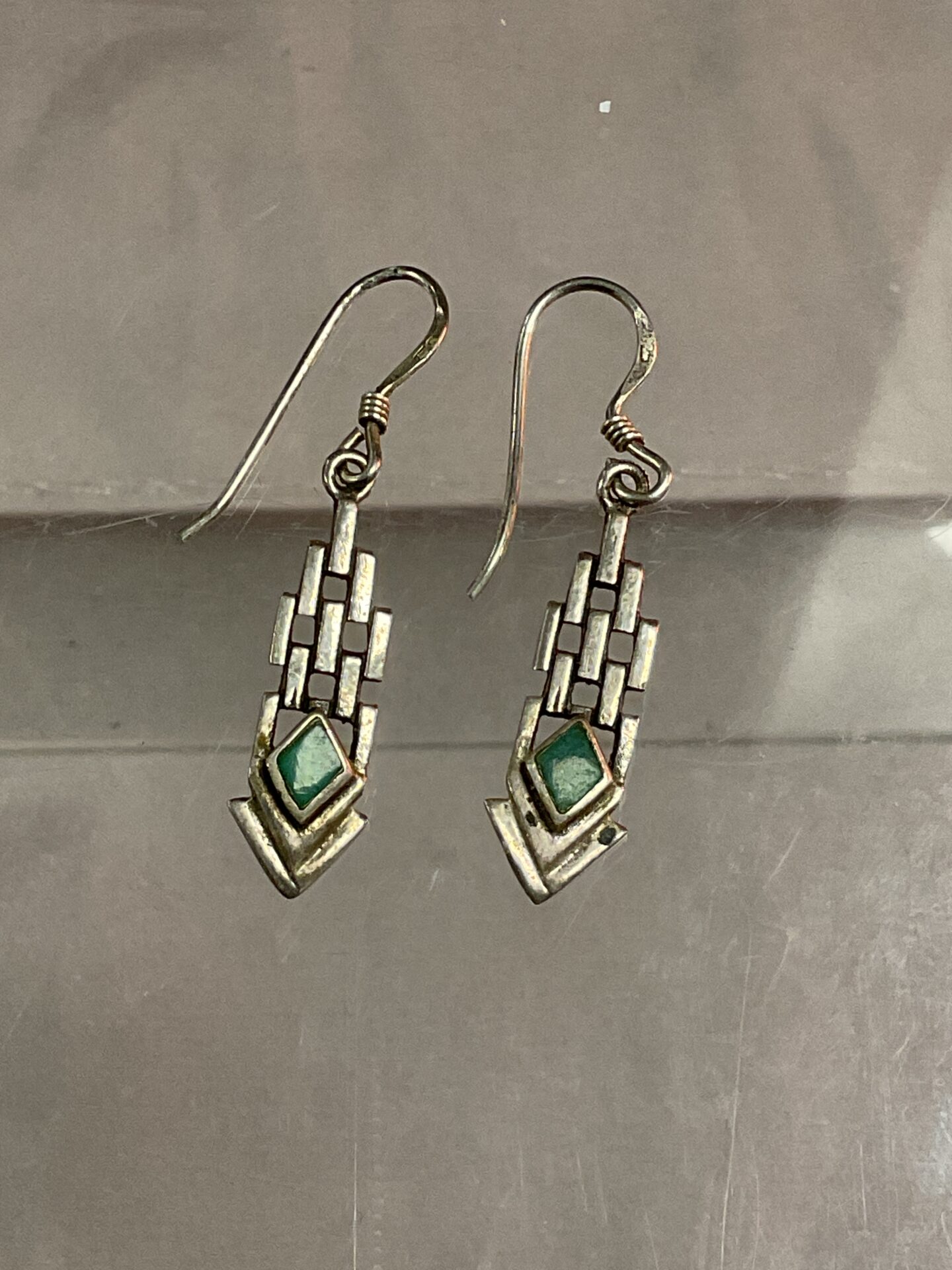 942 Pair of art deco silver drop green stone set earrings