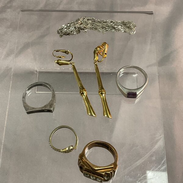 Vintage costume jewellery lot with silver and Trifari earrings.