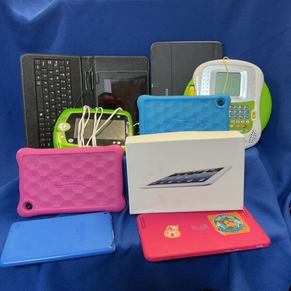 Lot of used tablet computers including Samsung Galaxy and Amazon Fire.