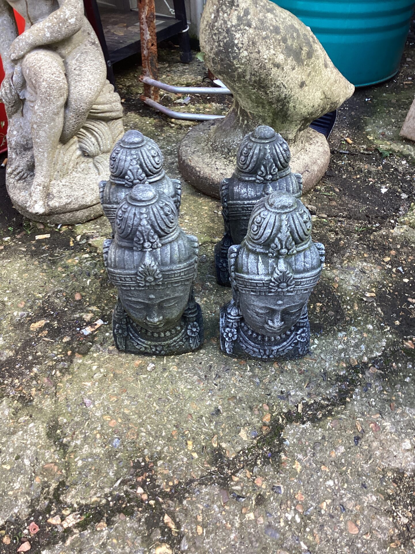 1242 Four Bhuda Head garden ornaments