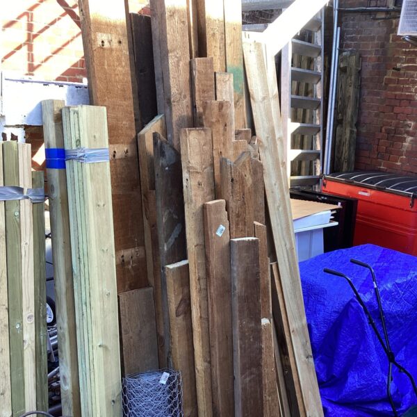 Quantity of weathered fencing timber for garden projects and DIY builds.