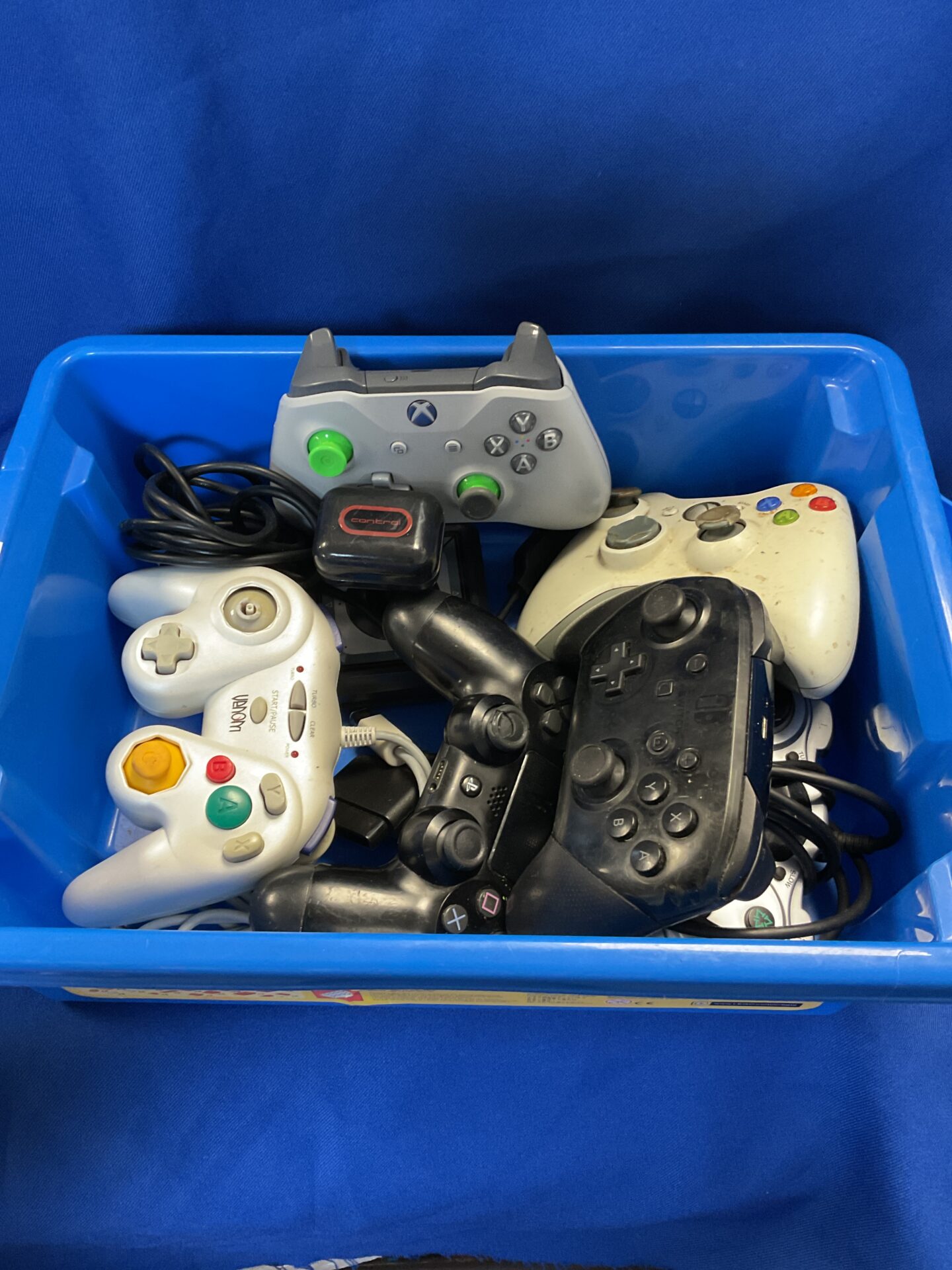 228 Box of gaming controllers inc Nintendo switch & sony ps4