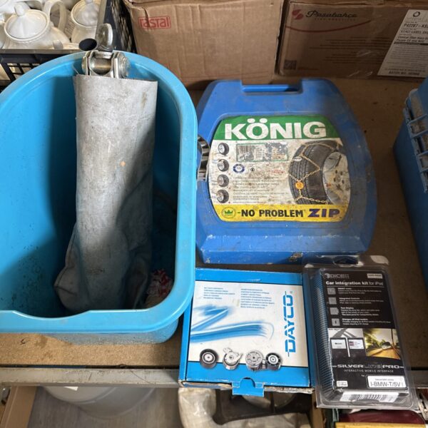 Blue bucket filled with various motoring parts and components.