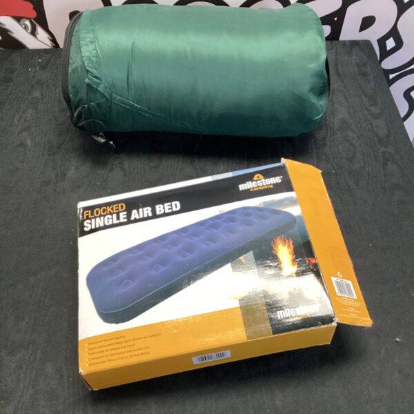 Flocked single air bed with integrated sleeping bag for camping.