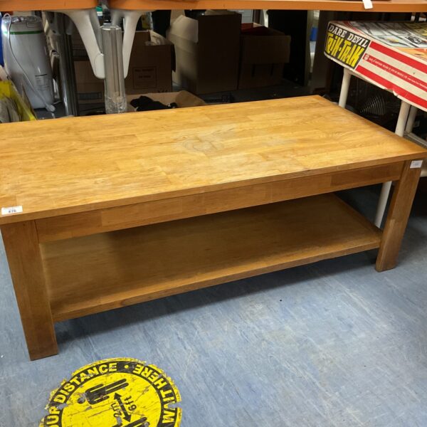 Rustic oak coffee table with visible wear and character.