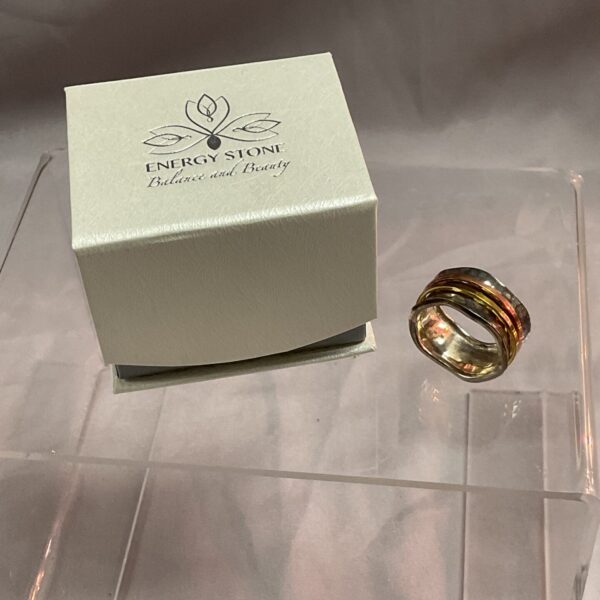 Close-up of the silver Breeze ring with a stone detail.