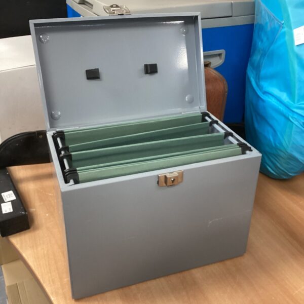 Vintage metal document box with internal dividers for office storage.