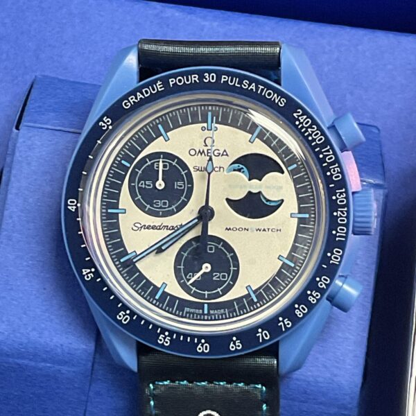 Front view of the blue Omega Swatch Moonphase bioceramic watch.