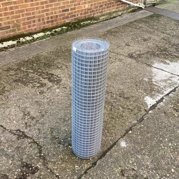 Roll of used wire fencing for garden or boundary use.
