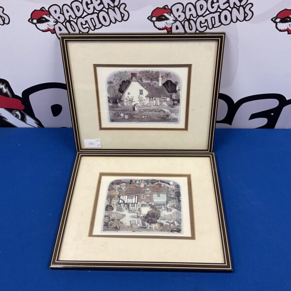 Pair of signed Graham Clarke cottage prints in a rural setting.