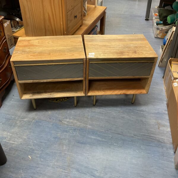 Pair of modern wooden bedside cabinets with single drawers.