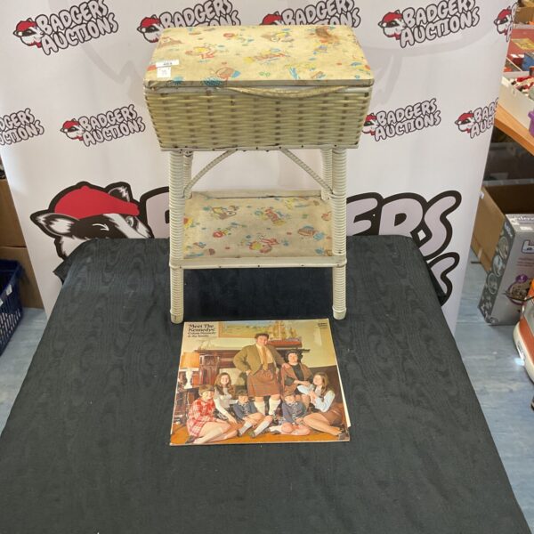 Vintage Magic Roundabout sewing table with colourful illustrations.