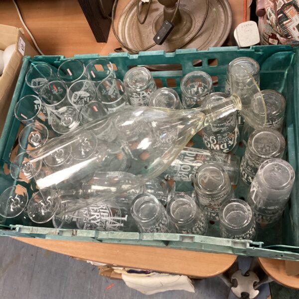 Mixed lot of assorted beer glasses including Peroni branding.