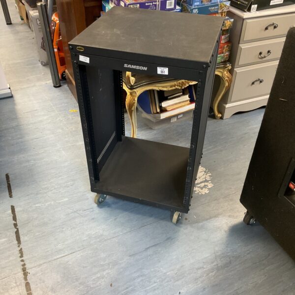 Black Samson amp rack with casters in a studio setting.