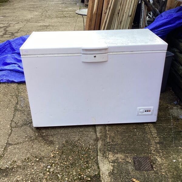 White Beko large chest freezer in a utility room setting.