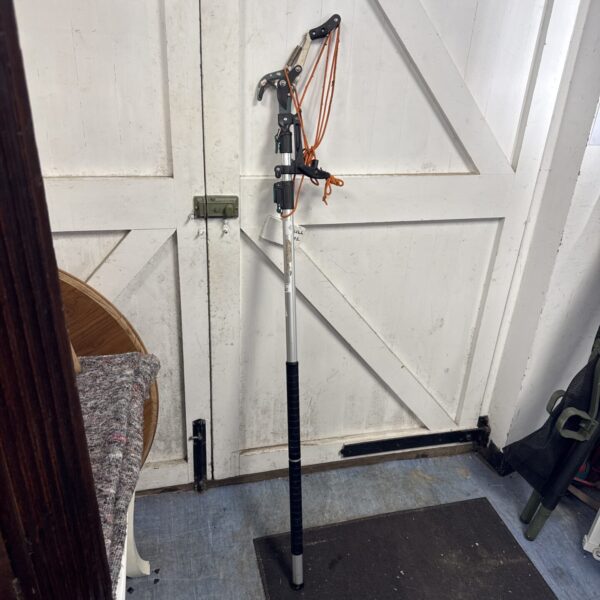 Long reach garden tree lopper for pruning branches.