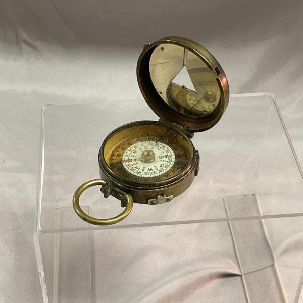 Vintage Mordaunt 1918 military compass for navigation and collection.