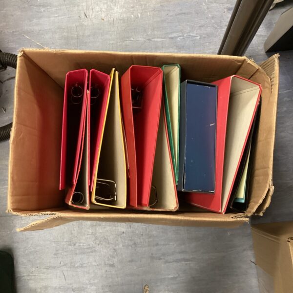 Lot of red file folders for document storage.