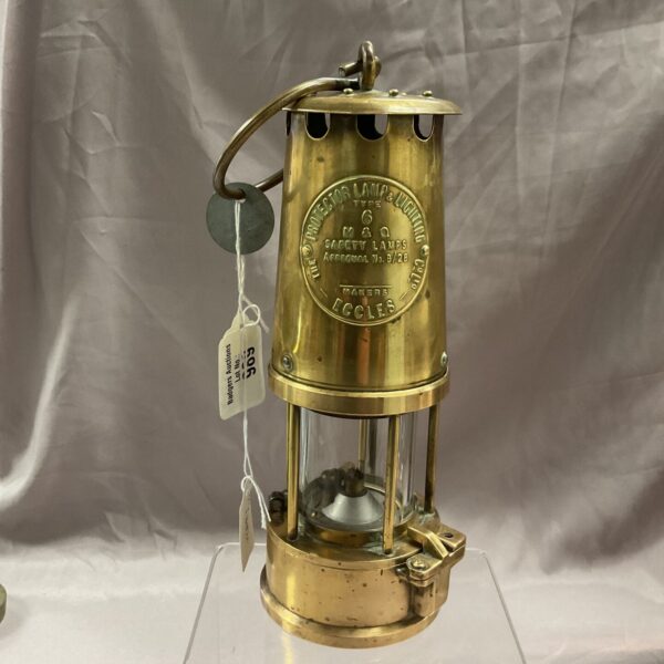 Antique Eccles Type 6 miners lamp with brass body and glass globe.