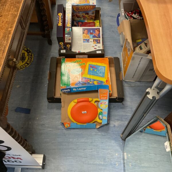 Mixed lot of vintage board games and toys including Operation and Buckaroo.