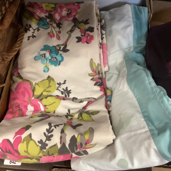 Colourful floral duvet cover set with pillowcases on display.