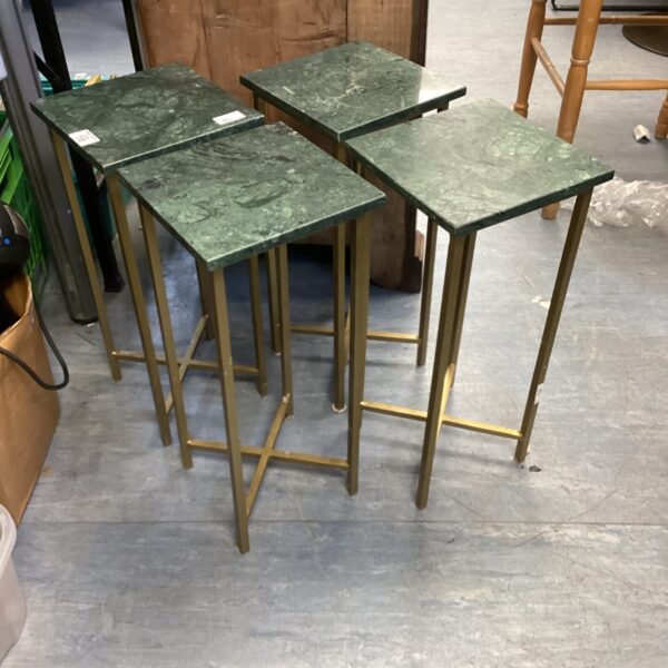 Set of four vintage green marble side tables with brass frames.
