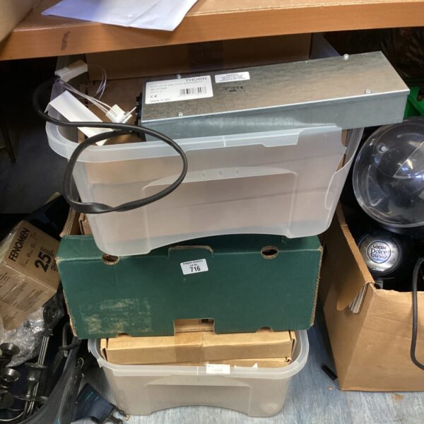 Three boxes of unopened LED light fittings for interior lighting.