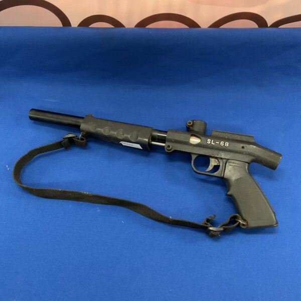 Vintage Lonestar SL-68 paintball gun with strap.