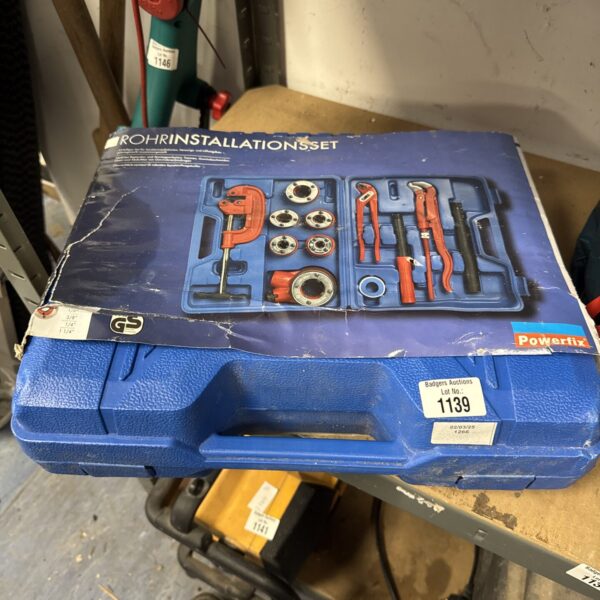Blue Rohr pipe installation set with various plumbing tools inside.