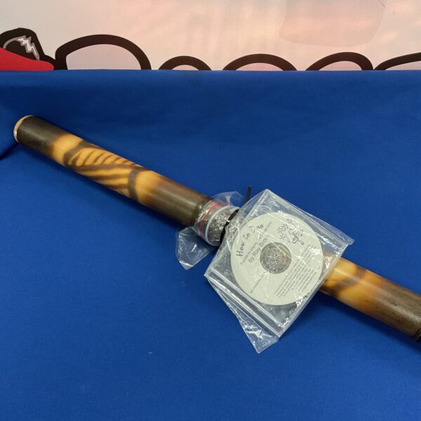 Aboriginal didgeridoo with how to play CD included.
