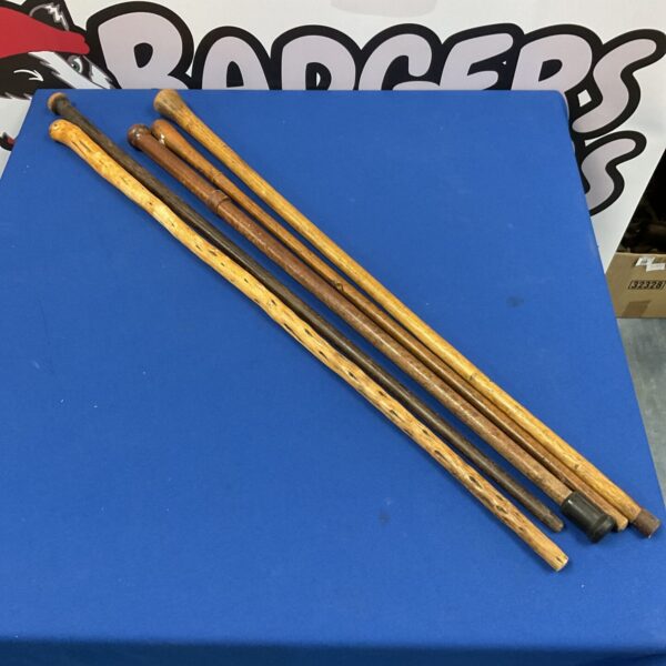 Lot of five vintage wooden walking canes for collectors.