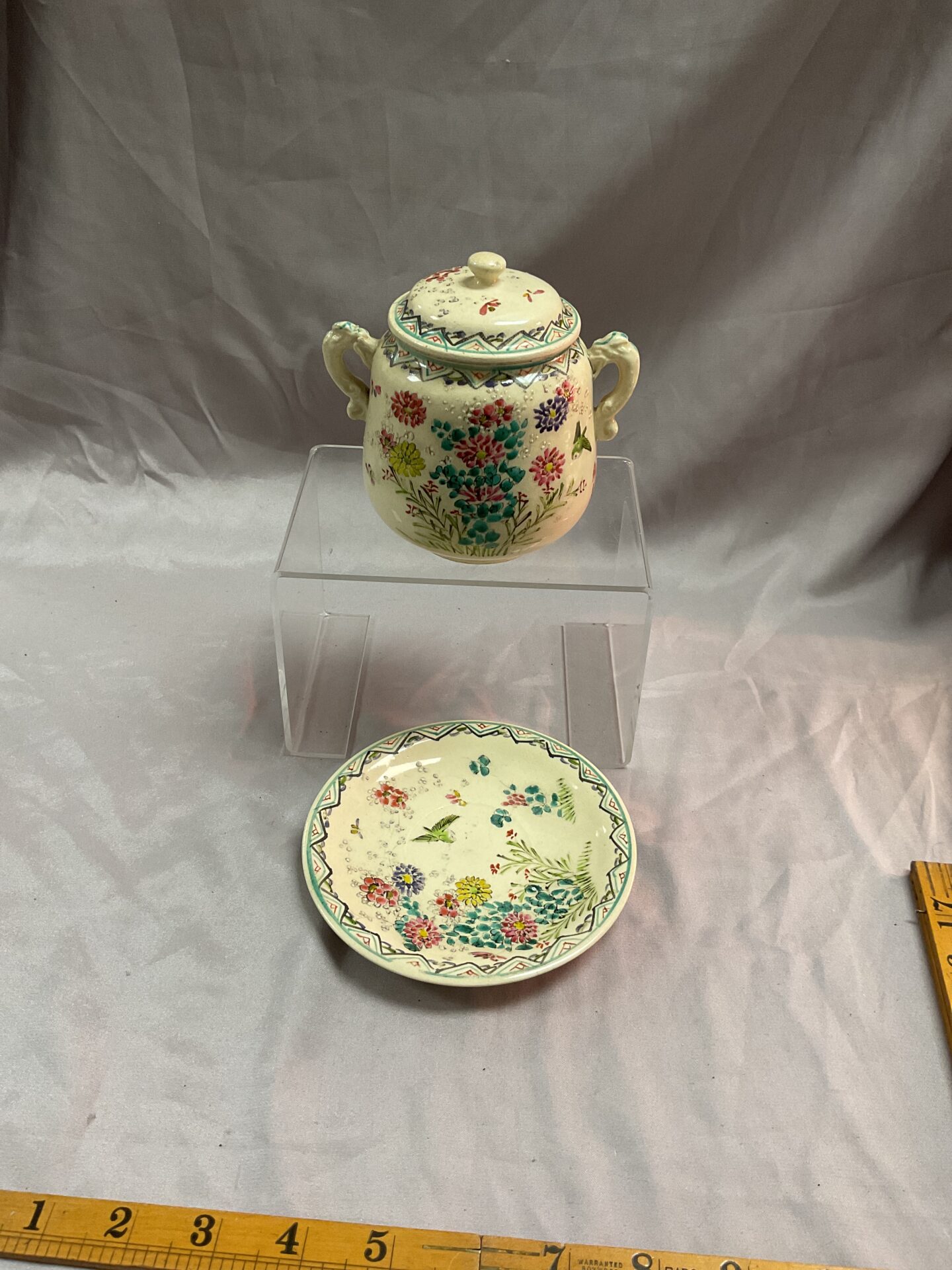 1029 Hand decorated Japanese lidded pot and saucer