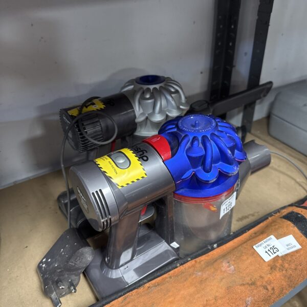 Two Dyson DC16 handheld hoovers for spares or repair.