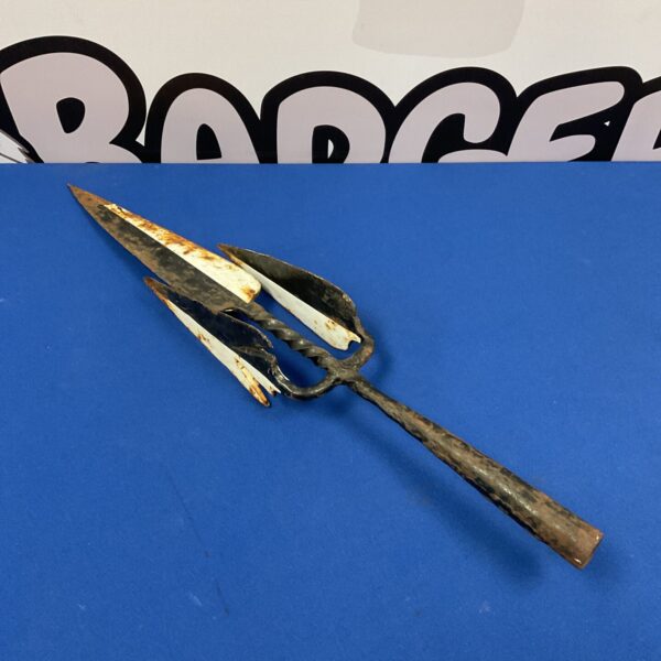 Antique wrought iron spearhead with a leaf-shaped blade.