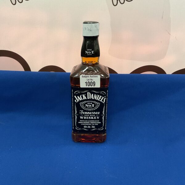 Sealed bottle of Jack Daniels Old No7 Tennessee whiskey.