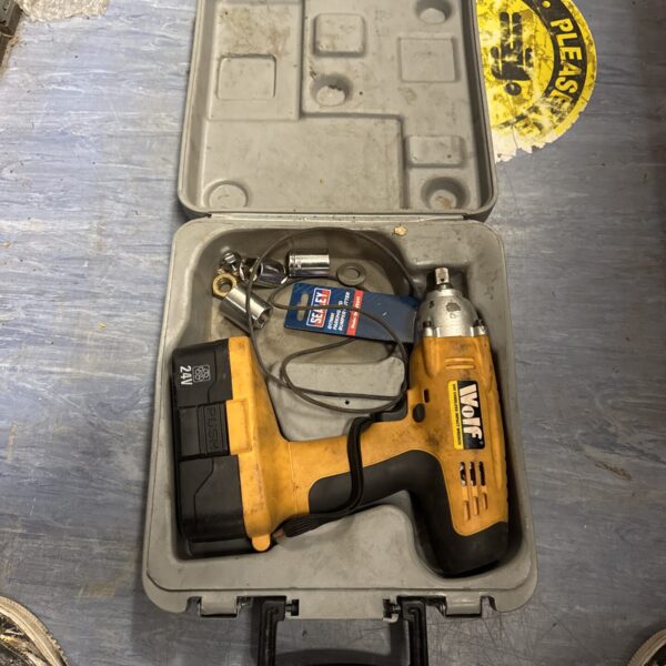 Wolf cordless impact driver in a moulded carrying case.