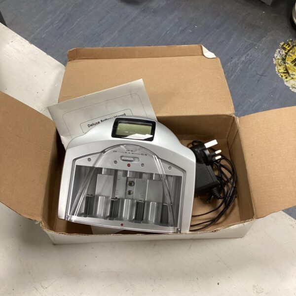 Front view of vintage Deluxe Battery Wizard battery charger.