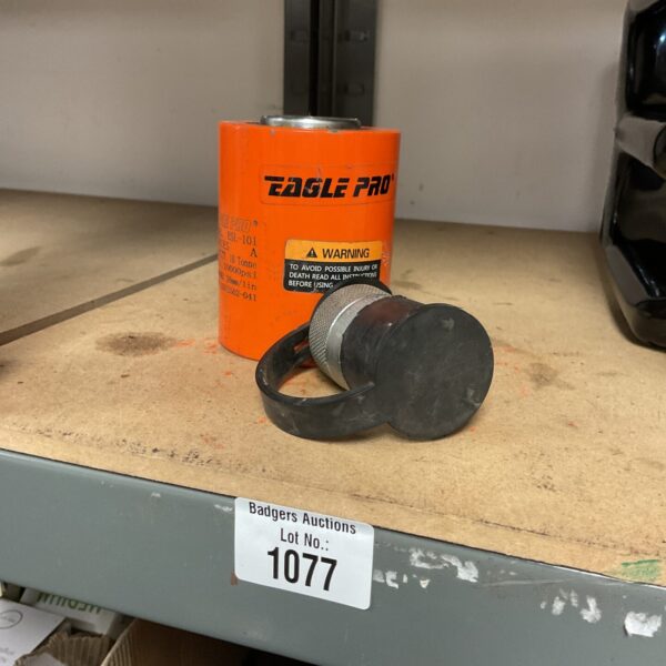 Orange Eagle Pro hydraulic mini jack for automotive lifting.